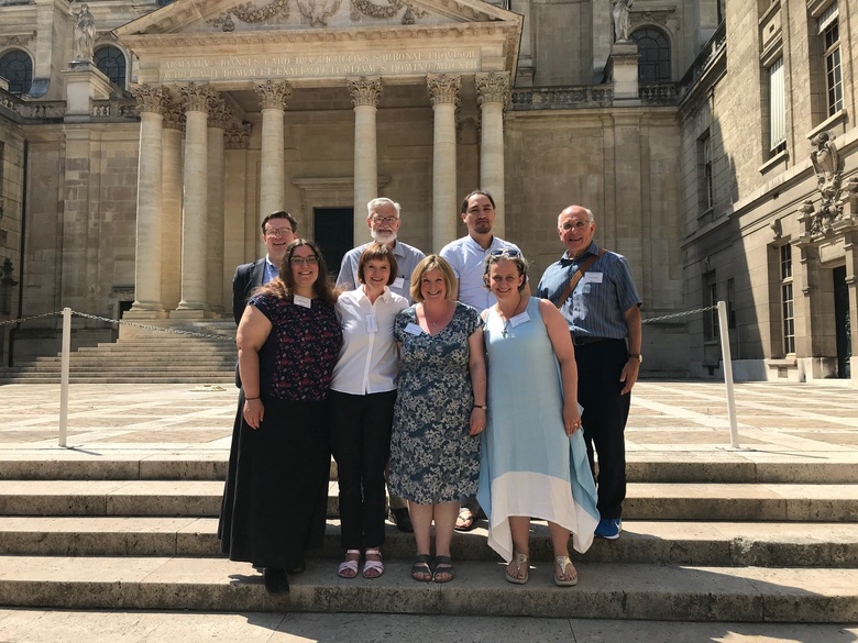 A group of Scott scholars in front of a Classical building.