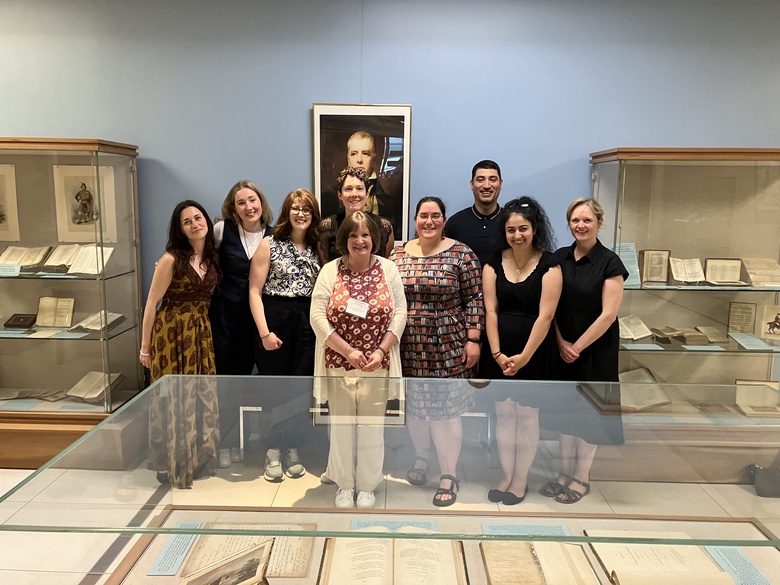 A group of Scott scholars in a library.