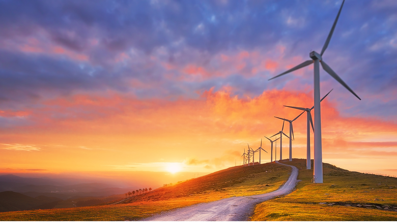 wind turbines on a hill in the countryside