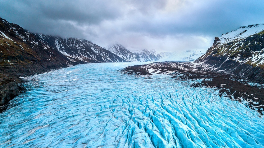 Estimating glacier surface velocities for ice avalanche events