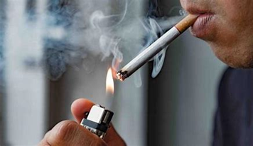 photograph showing lighting a cigarette