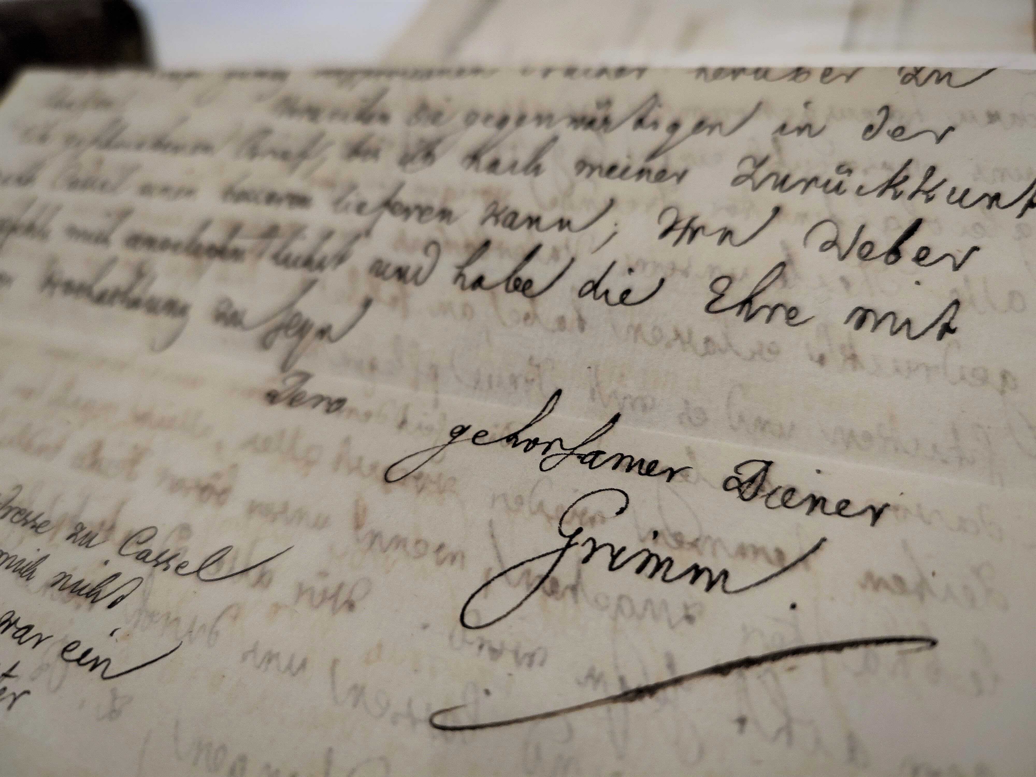A manuscript of a letter signed by Grimm.