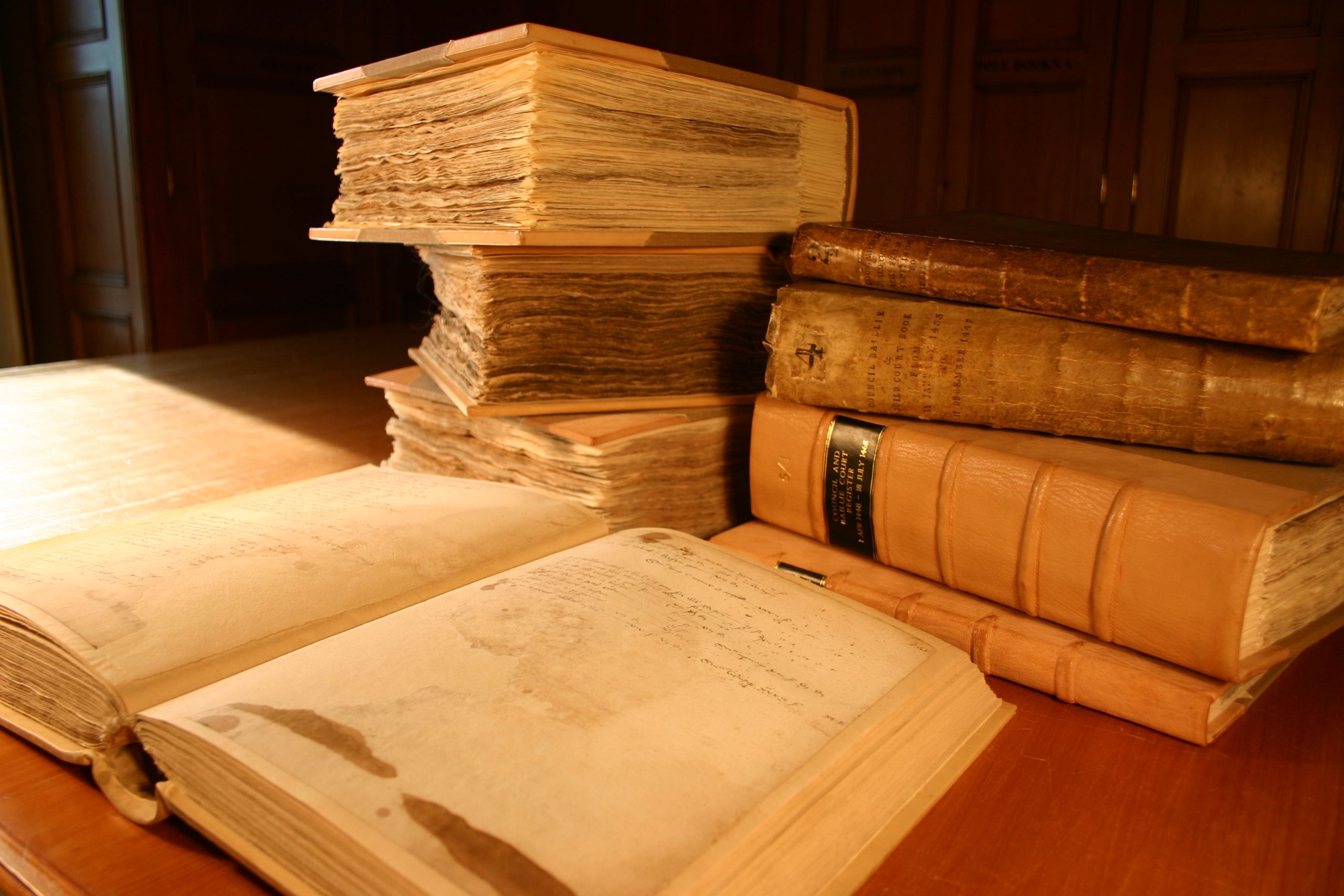 A pile of the registers with one lying open